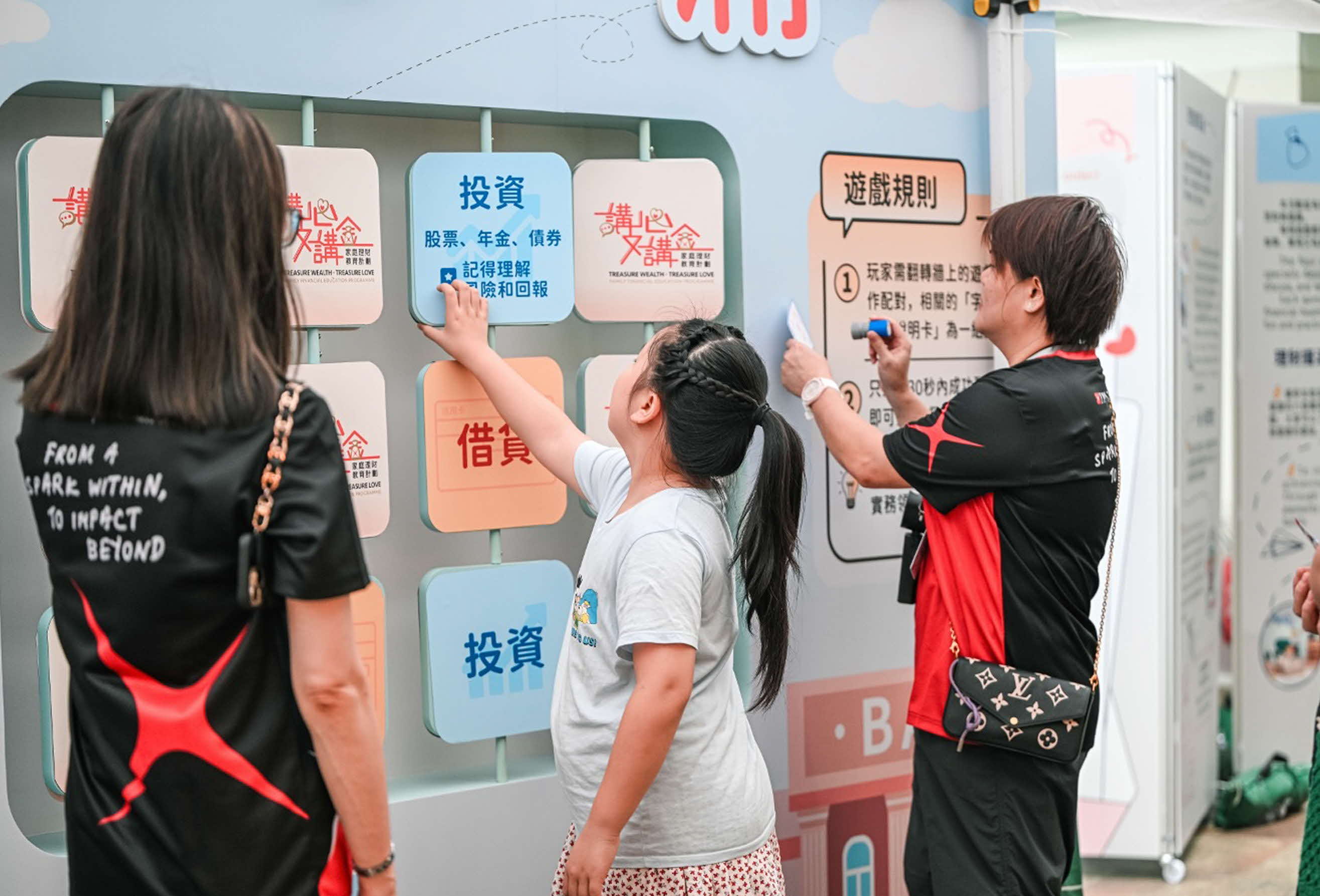 Child interacting with display wall