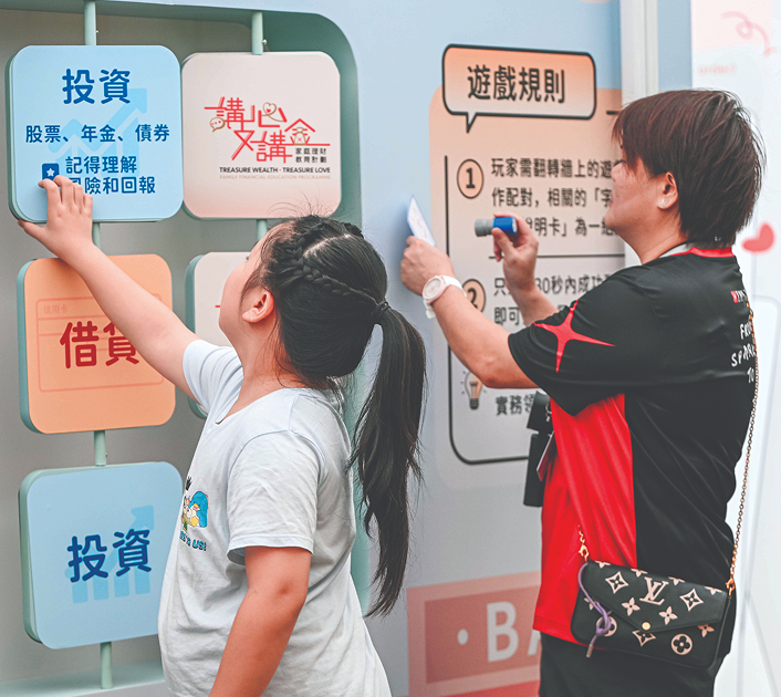 Child interacting with display wall
