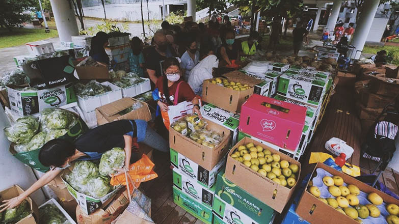 Volunteers of Food Rescure Sengkang ,sorting ugly food salvaged from Pasir Panjang Wholesale Centre in a call to reduce food waste