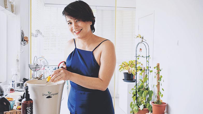 ONE FM 91.3 DJ Angelique Teo making compost using her food waste, while inside her apartment