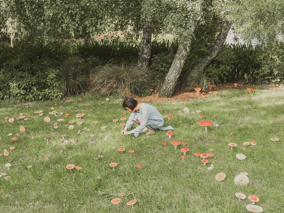 Dora embracing nature in an urban jungle.